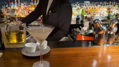Professional Japanese Bartender Preparing a Martini Cocktail Stock Footage 334712228