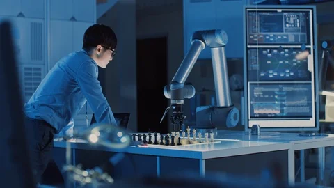 Professional Japanese Development Engineer is Testing an Artificial Intelligence Stock Footage 105348507