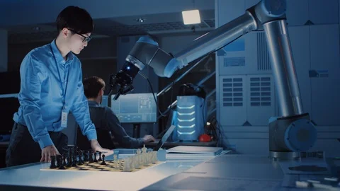 Professional Japanese Development Engineer is Testing an Artificial Intelligence Stock Footage 105350060