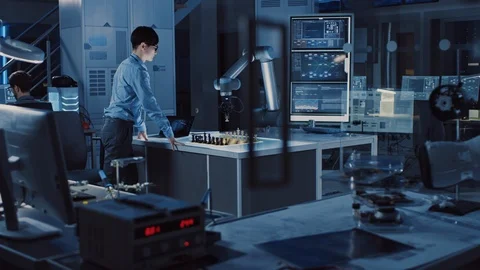 Professional Japanese Development Engineer is Testing an Artificial Intelligence Stock Footage 105350312
