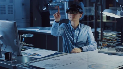 Professional Japanese Development Engineer is Working in a AR Headset Video stock 105342126