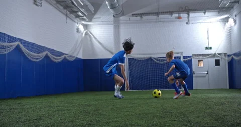 Professional junior soccer team, trainer and little boy football trainer Stock Footage 139217567
