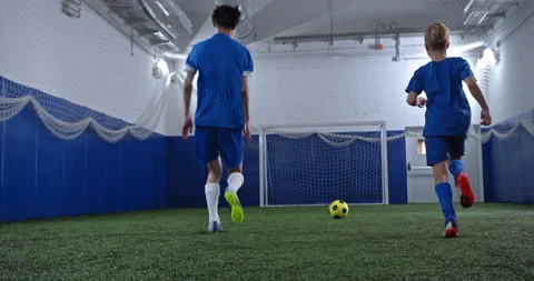 Professional junior soccer team, trainer and little boy football trainer Stock Footage 139217680