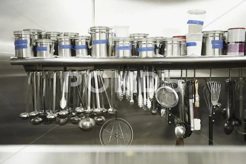 Professional Kitchen; Hanging Tools And Canisters Of Seasonings