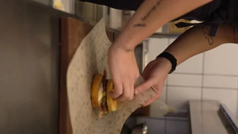 Professional Kitchen In Hotel Restaurant Chef Takes Burger Patty Out Of Package Stock Footage 196168170