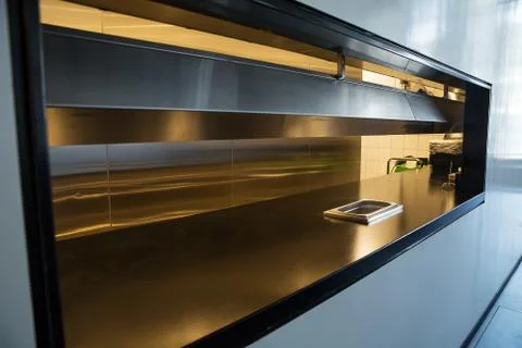 Professional kitchen, view counter in steel Stock Photos