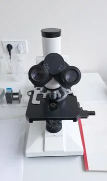 Professional laboratory microscope on a table indoors Photos