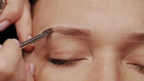 Professional lamination procedures of female eyebrows in beauty salon. Eyebro Stock Footage 161189094