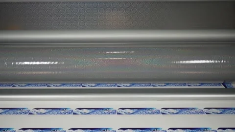 Professional large  Automatic roll  laminating machine with snow glitter film Stock Footage 145065290