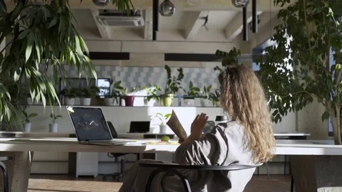 Professional lecturer holds notes and conducts online lesson Video stock 147243010
