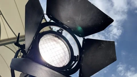 Professional Lighting Setup Against a Blue Sky Vidéo 333048946