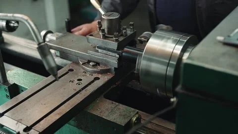 Professional locksmith is working at a lathe with plastic part Vidéo 284544335