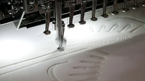 Professional machine for applying embroidery on different tissues closeup Stock Footage 90395386