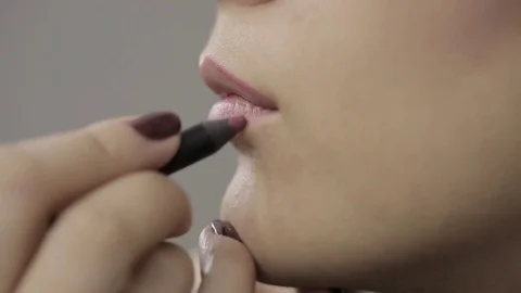 Professional Make-Up Artist Applying Lips Stock Footage 72899789