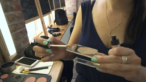 Professional make-up artist making face makeup art. Make up and fashion concept Stock Footage 77685116