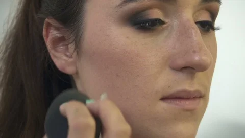 Professional make-up artist making face makeup art. Make up and fashion concept Stock Footage 77688429