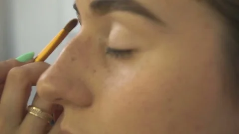 Professional make-up artist making face makeup art. Make up and fashion concept Video stock 77752895