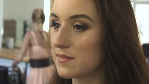 Professional make-up artist making face makeup art. Make up and fashion concept Stock Footage 77761825