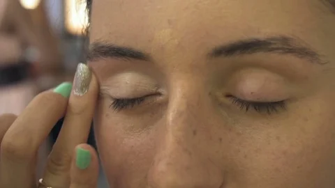 Professional make-up artist making face makeup art. Make up and fashion concept Stock Footage 78071656