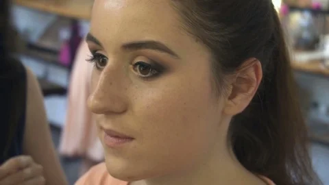 Professional make-up artist making face makeup art. Make up and fashion concept Stock Footage 78076857