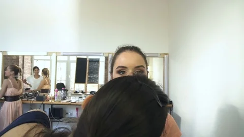 Professional make-up artist making face makeup art. Make up and fashion concept Stock Footage 78128988