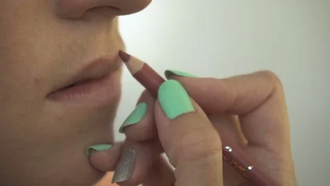 Professional make-up artist making face makeup art. Make up and fashion concept Stock Footage 78131210