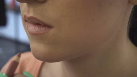 Professional make-up artist making face makeup art. Make up and fashion concept Stock Footage 78131429