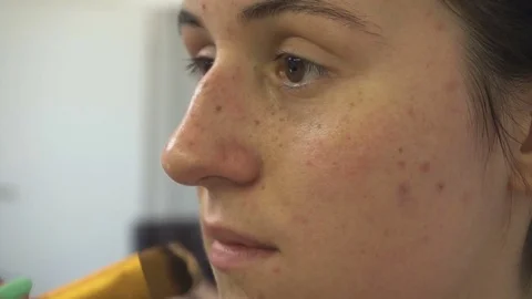 Professional make-up artist making face makeup art. Make up and fashion concept Stock Footage 79047556