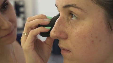 Professional make-up artist making face makeup art. Make up and fashion concept Stock Footage 79048151