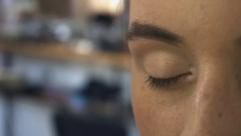 Professional make-up artist making face makeup art. Make up and fashion concept Stock Footage 79049361