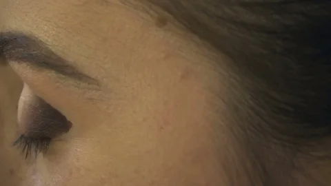 Professional make-up artist making face makeup art. Make up and fashion concept Stock Footage 79054415