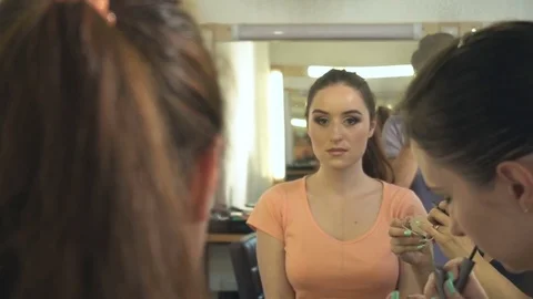 Professional make-up artist making face makeup art. Make up and fashion concept Stock Footage 79063888