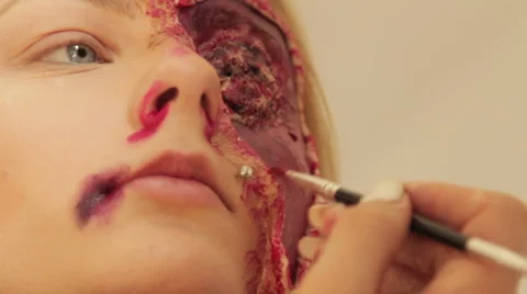 Professional make up artist making herself a Halloween mask (4/11) Stock Footage 48846139