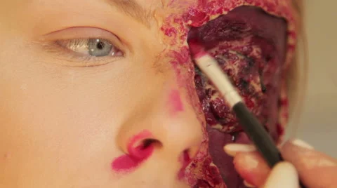Professional make up artist making herself a Halloween mask (5/11) Stock Footage 48846389