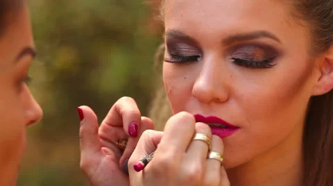 Professional Make-up artist with modell Stock Footage 55155323