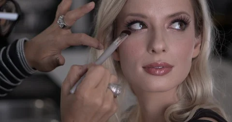 Professional make-up artist at work Stock Footage 123529226