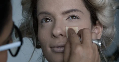 Professional make-up artist at work Stock Footage 124763651