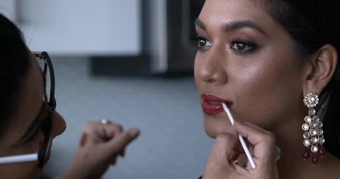 Professional make-up artist at work Stock Footage 125963270