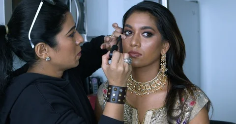 Professional make-up artist at work Stock Footage 125963527