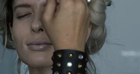 Professional make-up artist at work Stock Footage 125963643