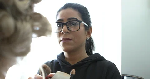 Professional make-up artist at work Stock Footage 125963655