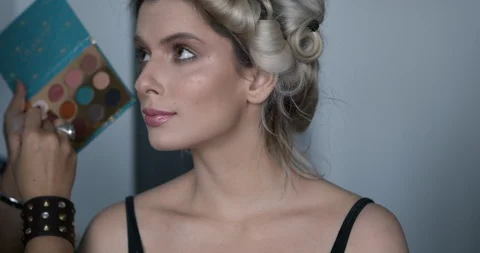 Professional make-up artist at work Stock Footage 125963691