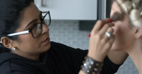 Professional make-up artist at work Stock Footage 125963714