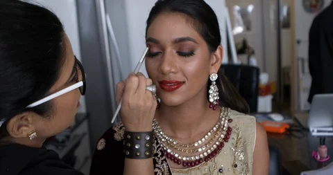 Professional make-up artist at work Stock Footage 125963784