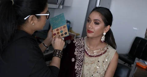 Professional make-up artist at work Stock Footage 125963791