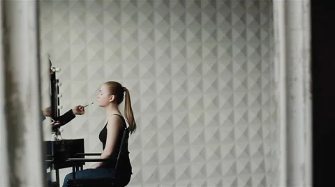 Professional make-up artist at work. Medium shot Stock Footage 54900571