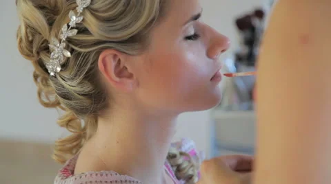 Professional make up artist working on a model Stock Footage 63768403