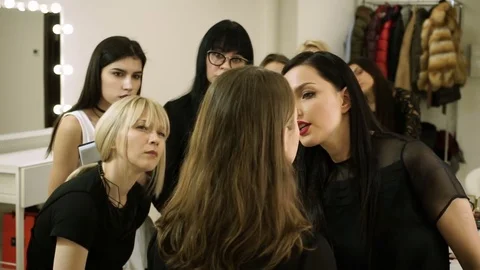 Professional make-up artists learning about make-up techniques on training. HD Stock Footage 72869776
