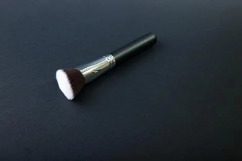 Professional make-up brush on black background, natural cloth, m Foto stock