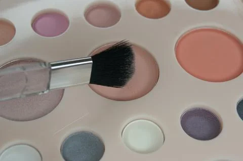 Professional make-up corrector and make-up brush, closeup Stock Photos